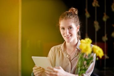 Tablet, portrait and woman in cafe with remote work,...