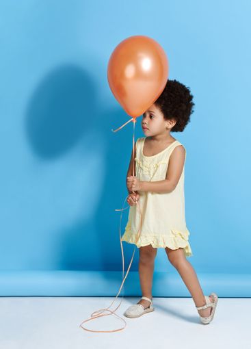 Cute, girl and balloon for fun, happiness and childhood...