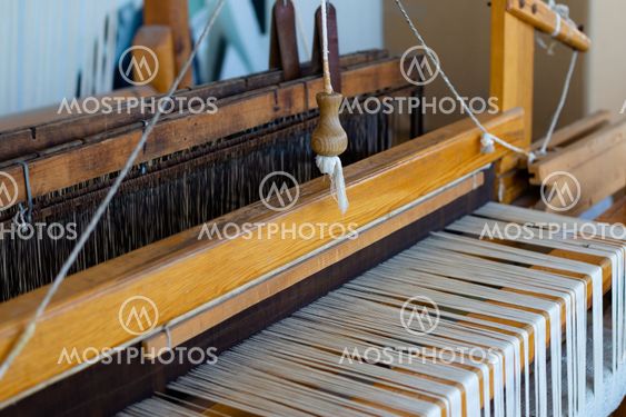 Ancient loom, fabric hand made.