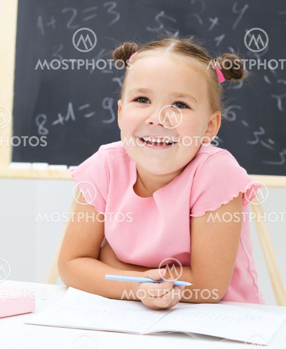 Portrait of a little girl in school