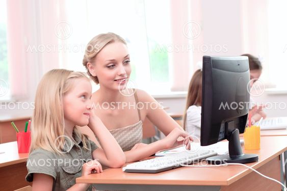 teacher explains the task schoolgirl