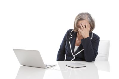 Older stressed woman - elder woman isolaed on white...