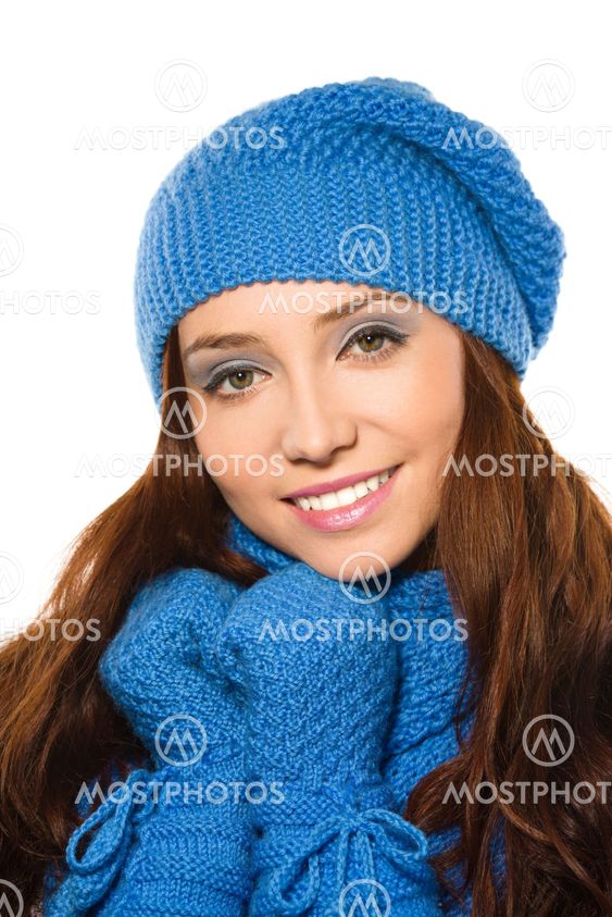 Young happy woman wearing winter cloth