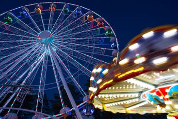 A colourful ferris wheel in Luna park during night.