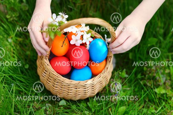 Colorful easter eggs in a basket