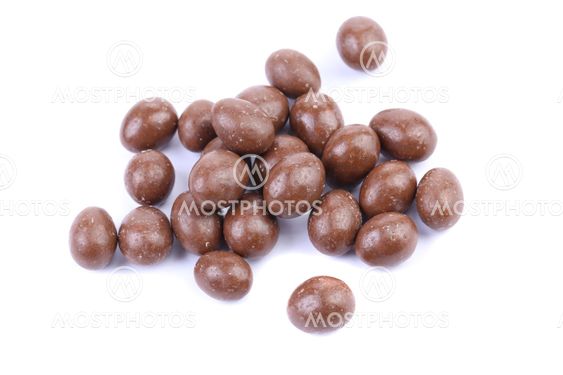 Dark brown dragee, in chocolate covered.