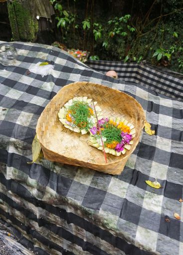 Traditional balinese offerings to gods in Bali with...