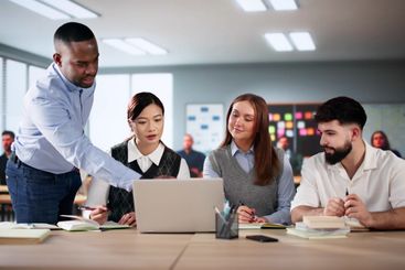 People Studying Knowledge In Classroom Indoors