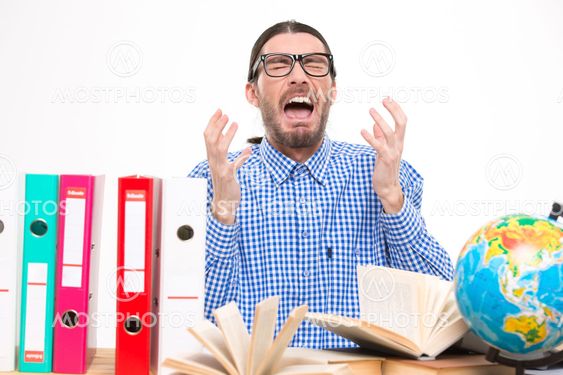 Angry stressed man screamin with hands up