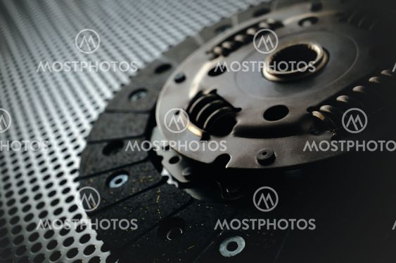 Car clutch on a metal surface