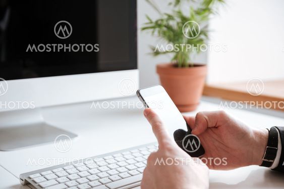 Cropped image of businessman chatting by phone.