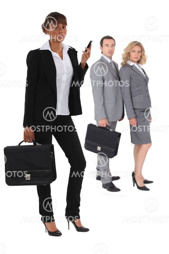 Three businesspeople standing together