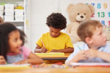 Preschool, students and child with writing for...