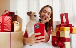 Festive Joy Woman and Her Beloved Dog Joyfully Celebrate...