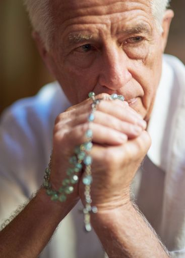Christian, rosary and elderly man with thinking in...