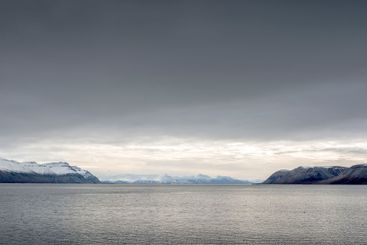 Snowy mountains and sea in Svalbard, Norway
