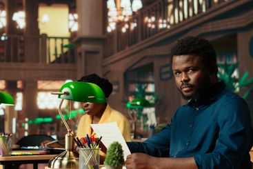 Determined pupil preparing for exams at the campus library