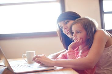 Remote work, child and woman with laptop, online and...