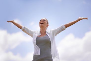 Happy woman, freedom and joy with open arms for success,...