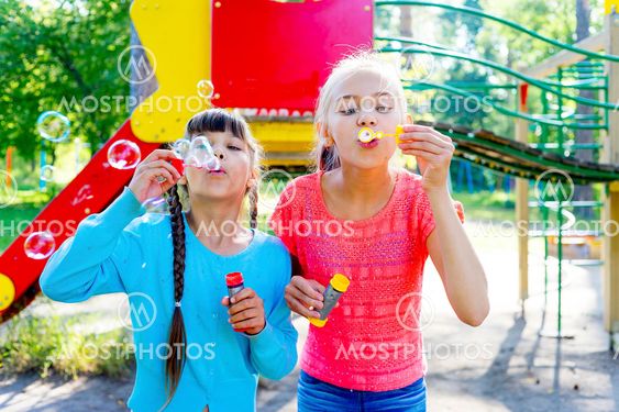 Kids with soap bubbles