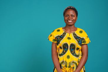 Portrait of natural smiling woman dressed in traditional...