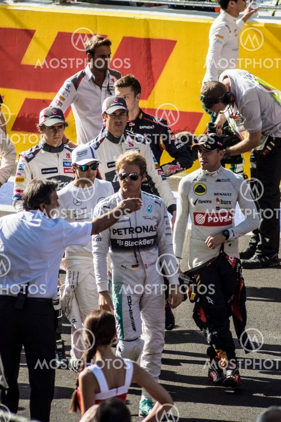 The pilots of formula one gathered together on the...