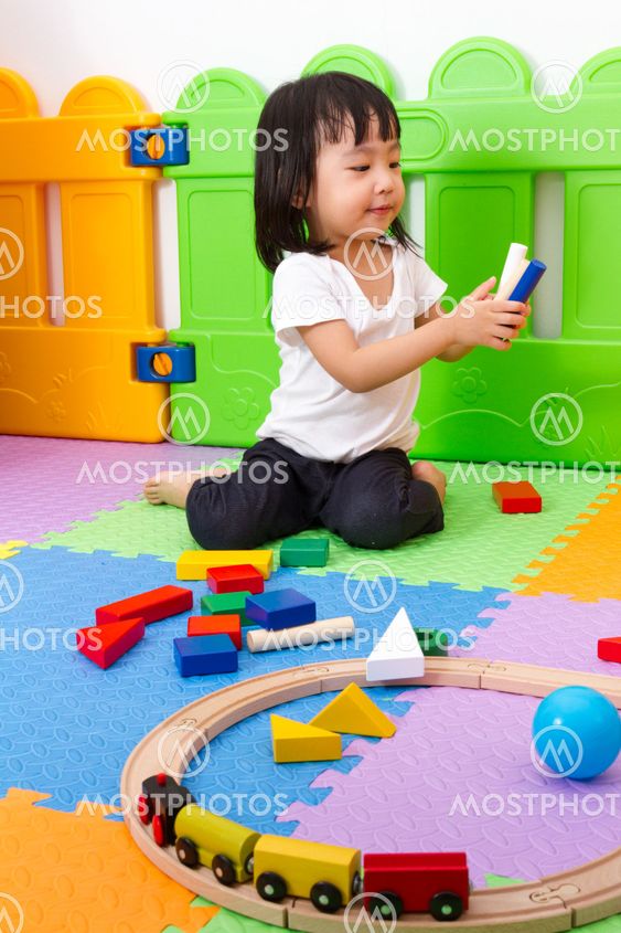 Asian Chinese children playing with blocks