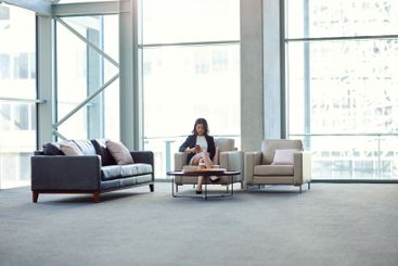 Office, sofa or businesswoman with phone for...