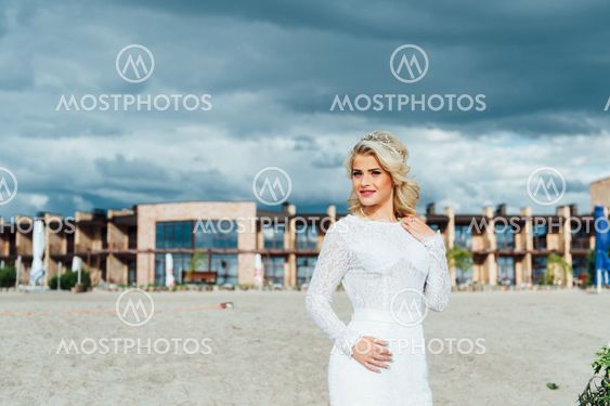 Beautiful young bride in luxury wedding dress