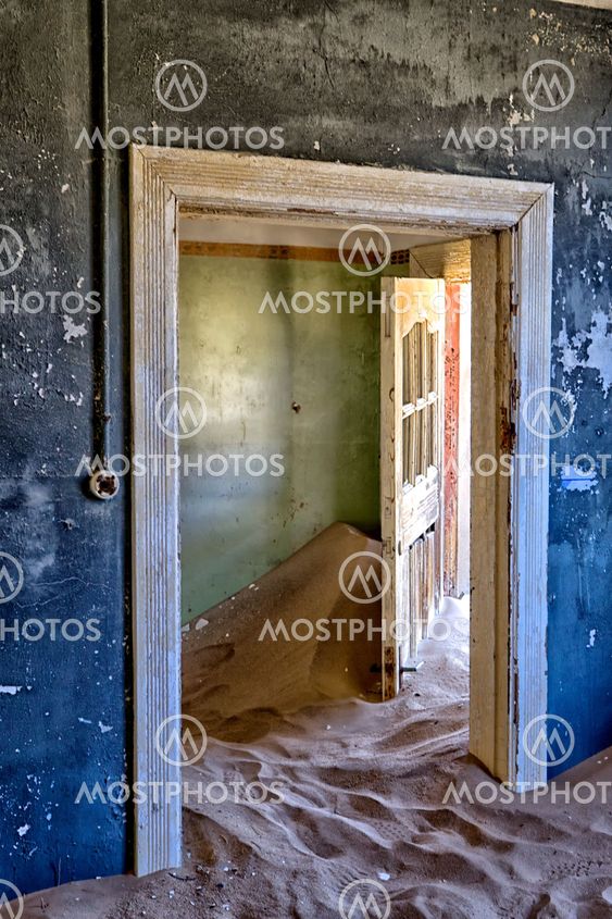 house overtaken by dune sand at kolmanskop ghost town near luderitz namibia