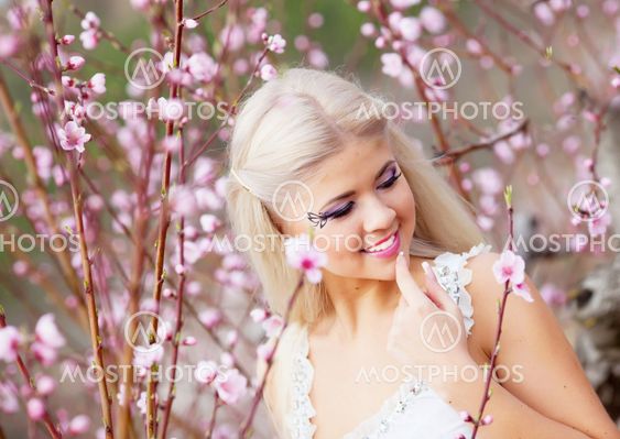 Girl in blossom garden