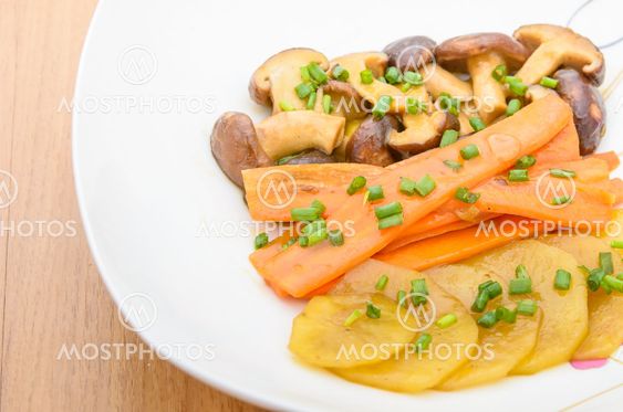 Fried Shiitake mushroom, carrot and potato with butter...