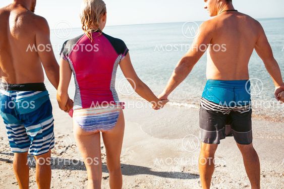 Friends on the beach. Have fun at sunny summer day