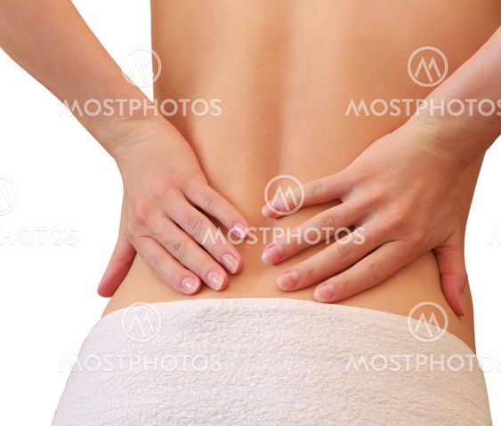 Woman holding back the hands. Beautiful female body...