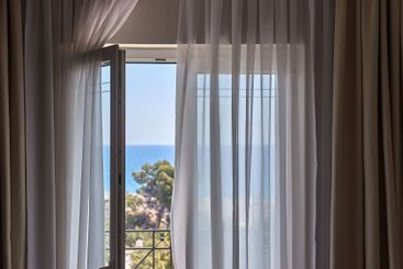 Apartment with sea view, open balcony door