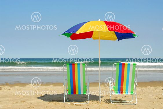 Beach chairs and umbrella