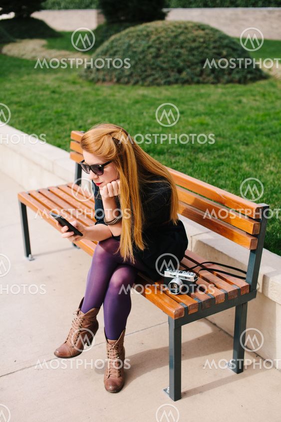 Young woman texting