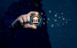 Global currency exchange. Businessman holding virtual...