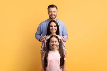 Family togetherness captured in a cheerful setting with...