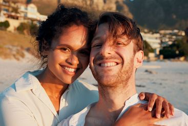 Happy, couple and portrait at beach on holiday, summer...