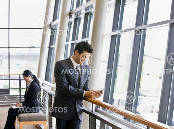 Young Businessman Texting