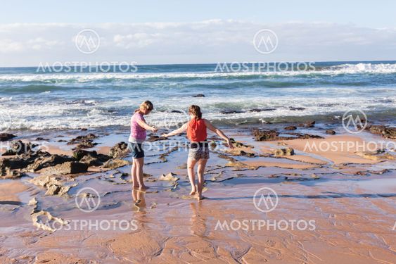 Girls Beach Ocean Exploring