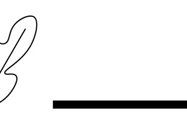 Creative professional using laptop while sitting on...