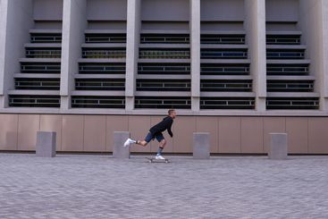City, speed and man with skateboard, practice and skills...