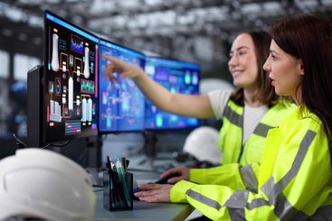 Female Engineer Monitoring Electricity Generation