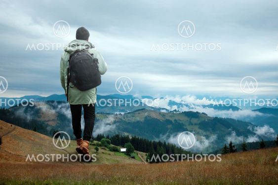 Creative background, A man is giant, a man is a tourist,...