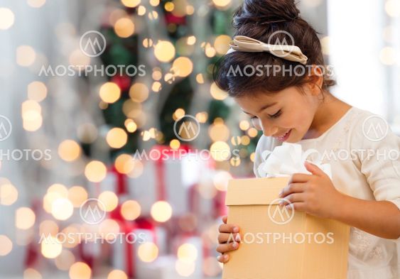 smiling little girl with gift box