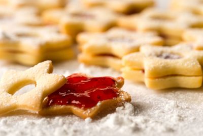Christmas cookie stars with strawberry jam