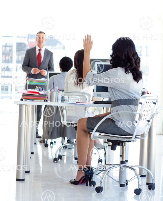 Busineswoman asking a question in a meeeting office