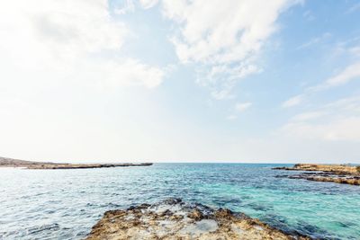 Daylight view to Nissi Beach with colorful bright blue...
